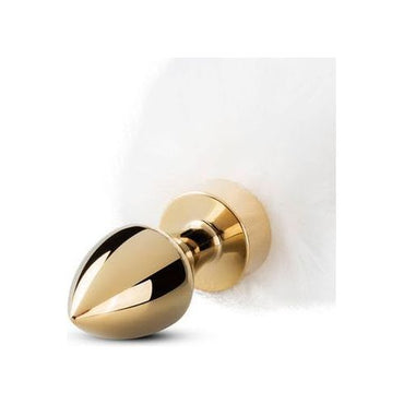 Kleine goudkleurige buttplug met witte vossenstaart