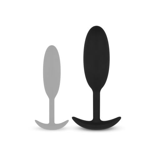 Heavy Fulfiller butt plugs in black and grey silicone, designed for comfort and enhanced sensations. Ideal for sex artikelen.