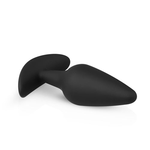 Zwarte buttplug uit de Pleasure Kit, gemaakt van flexibel siliconen voor anale stimulatie. Ideaal voor beginners.